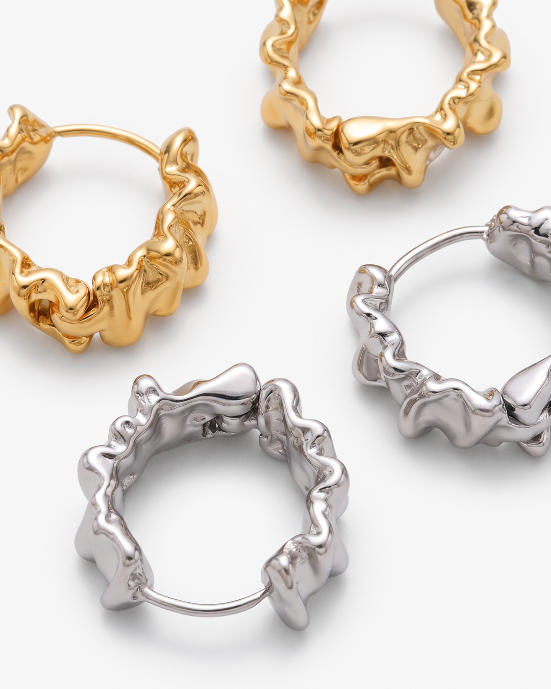 Elin - Draped huggie earrings - Stainless steel