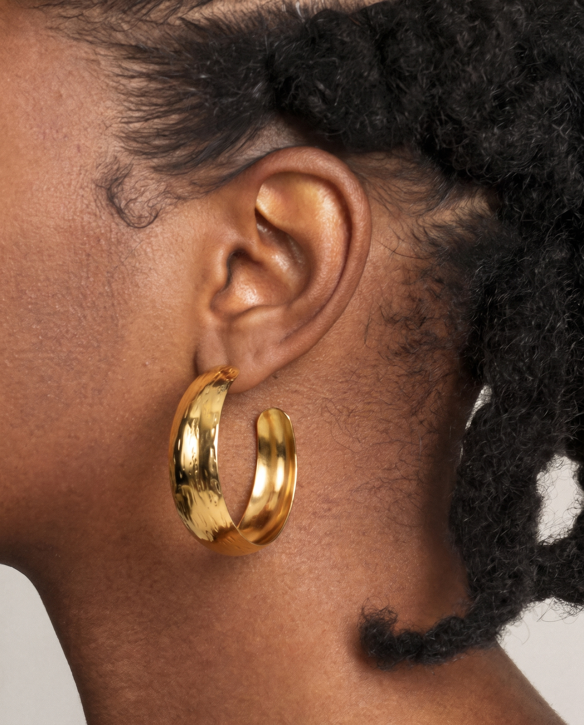 Carved hoop earrings